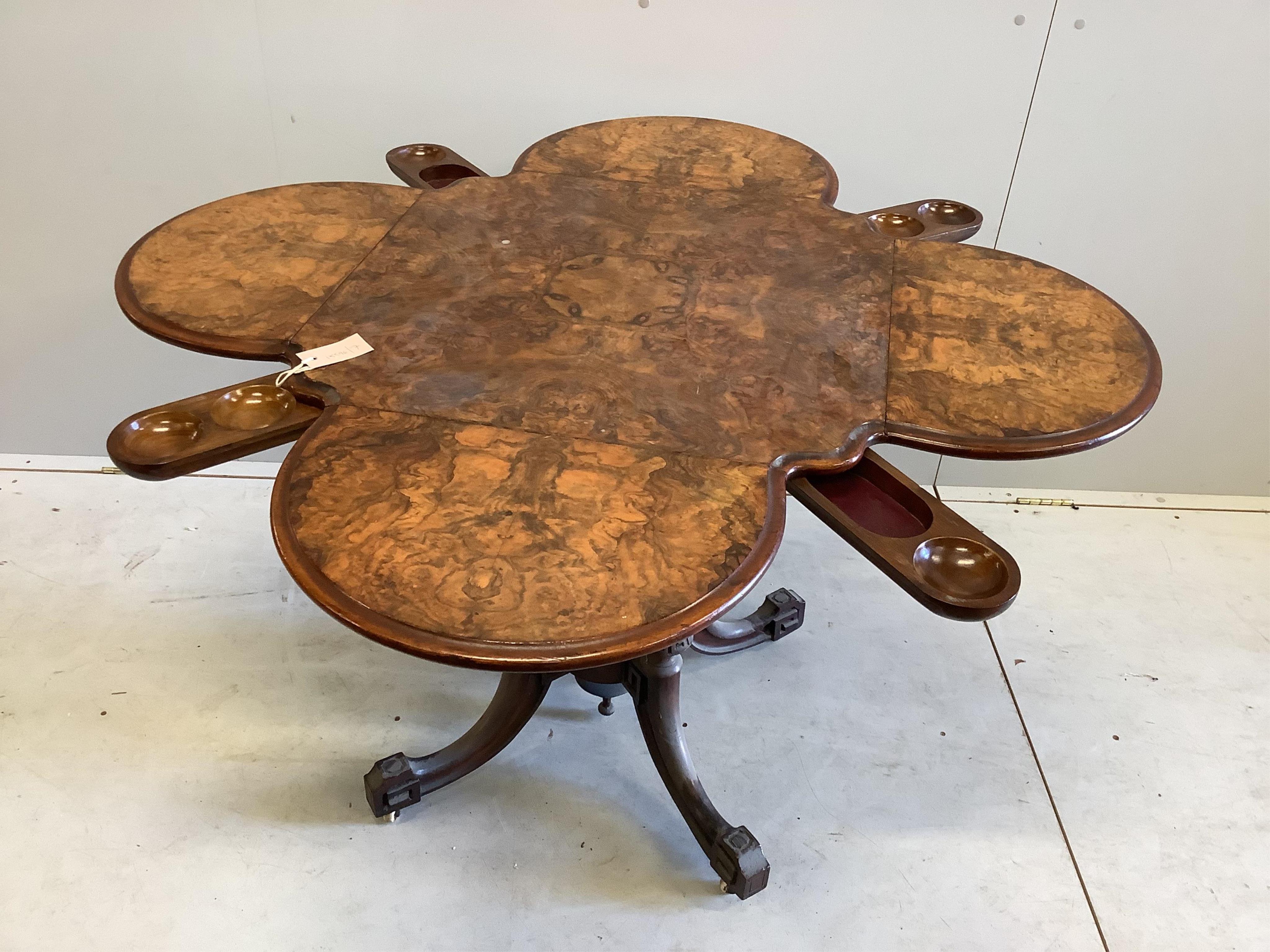 A Victorian burr walnut drop flap centre table, width 64cm, height 73cm. Condition - fair to good